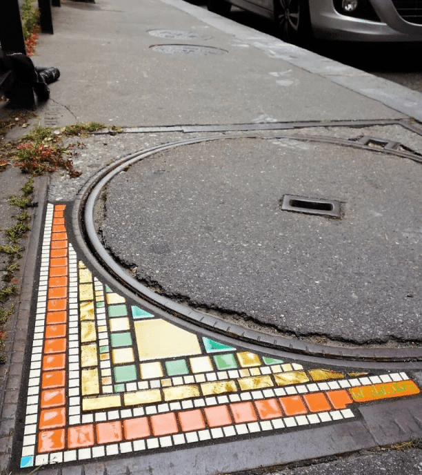 Humble Street Artist Fills Potholes With Colorful Mosaics